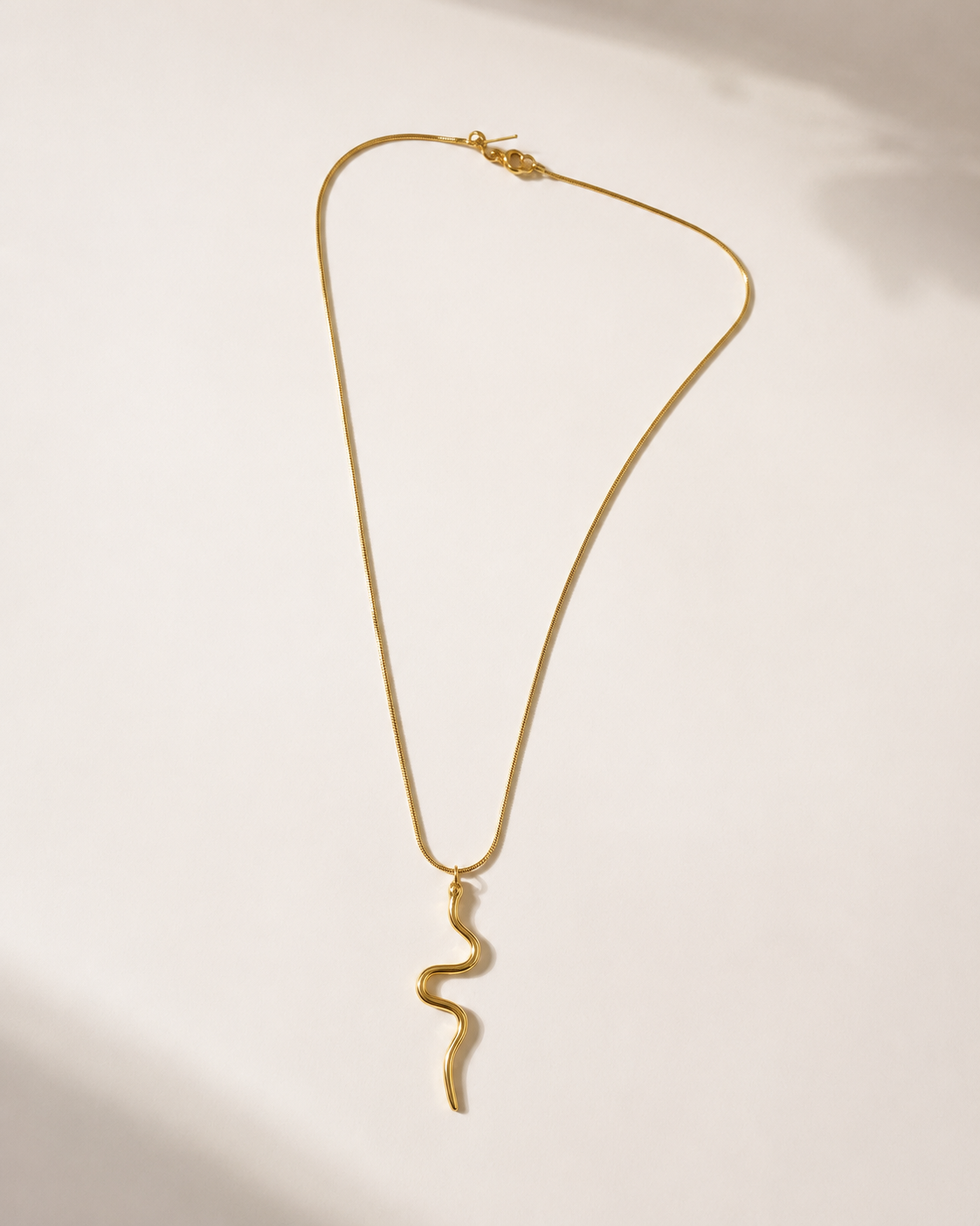 the gold snake necklace