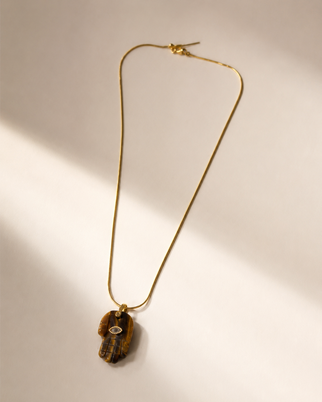 the tiger's eye hamsa